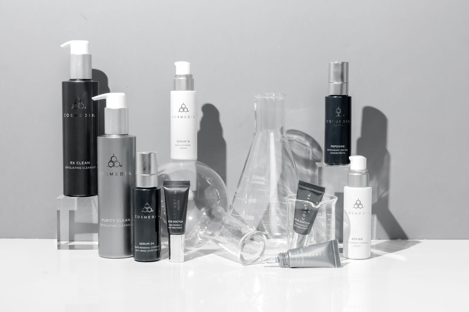 Professional aesthetician conducting a personalized skin analysis and skincare consultation at The Skin Clinique, helping a client select products suited to her individual skin type and concerns.