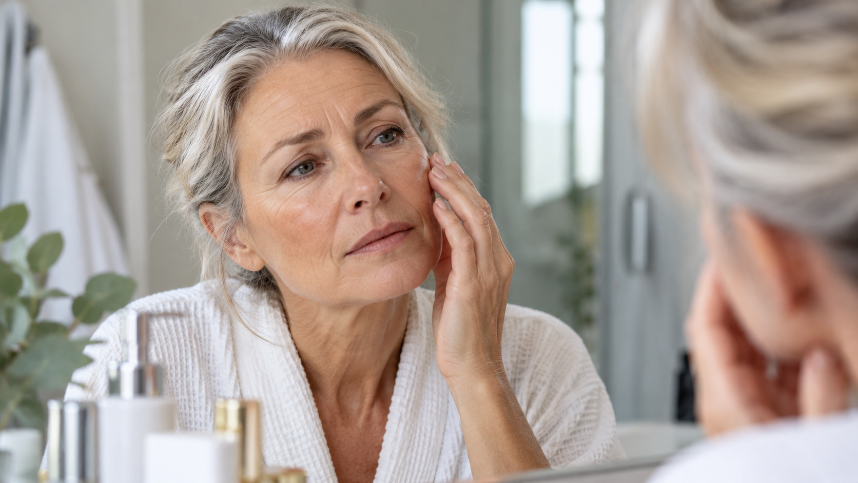 Mature woman receiving an advanced anti-aging facial treatment with professional skincare technology