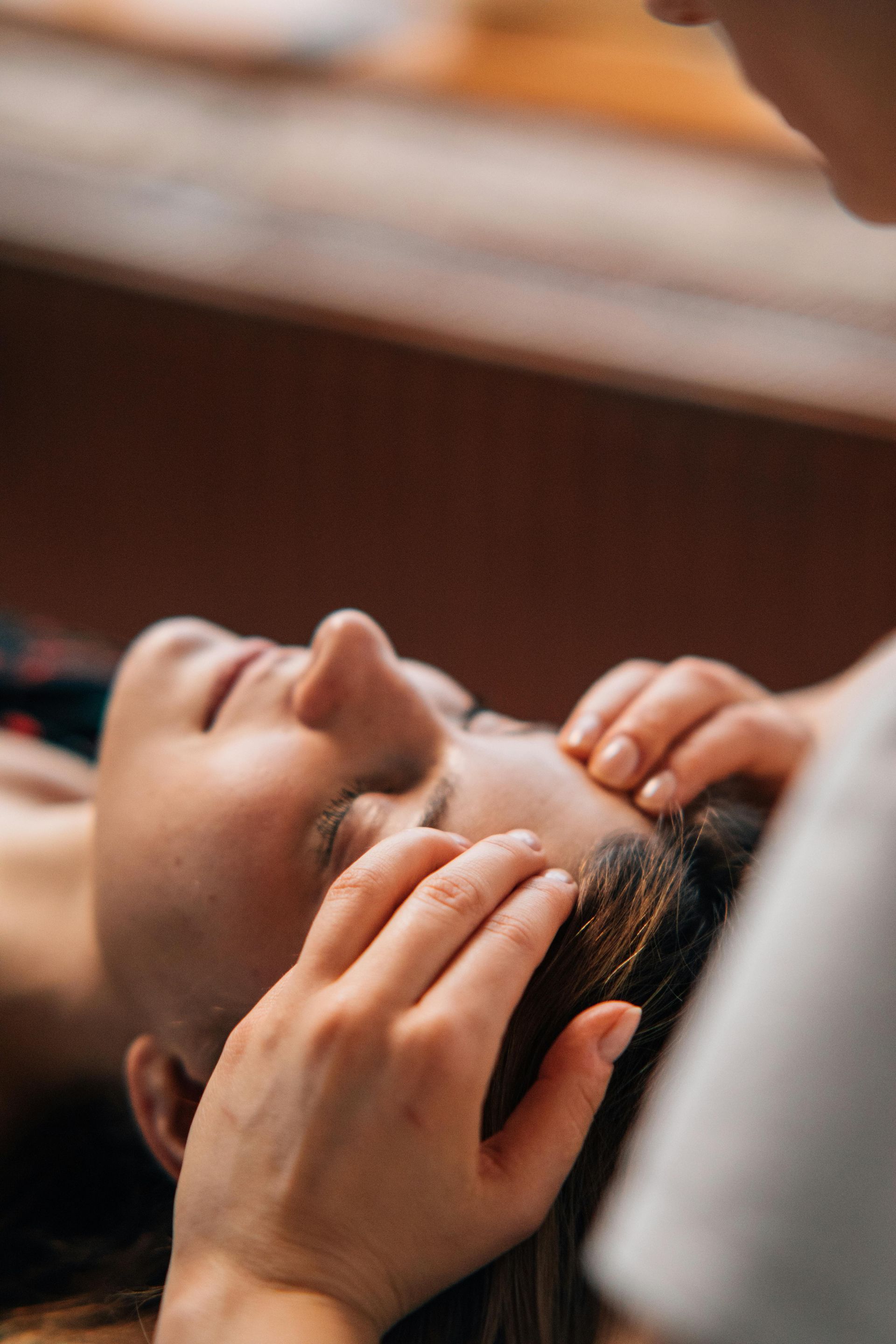 Woman receiving a Custom Facial