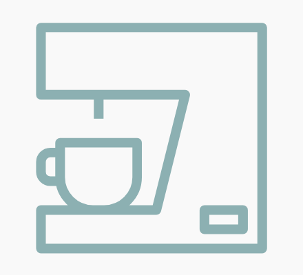 Cafetera con taza.