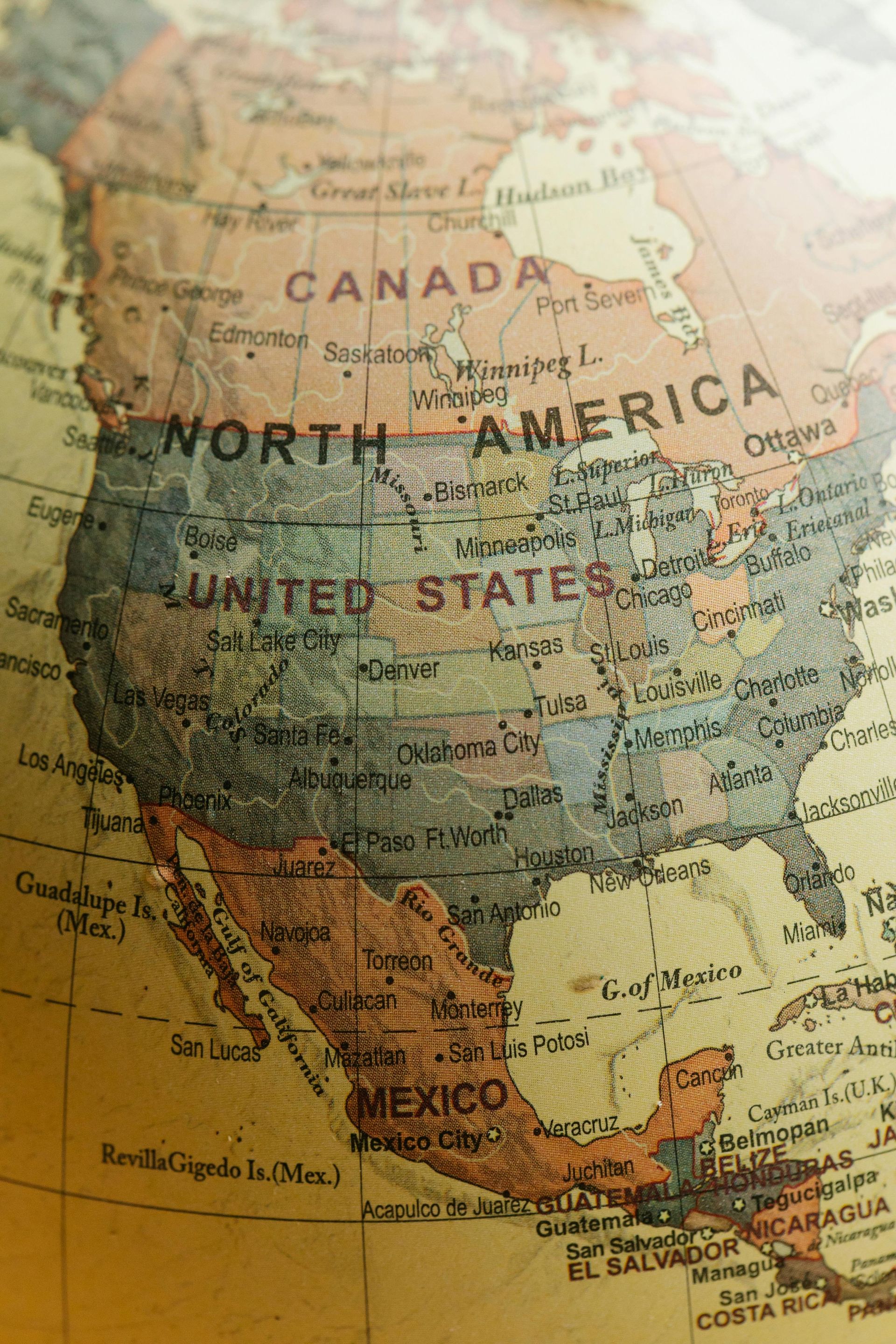 Close-up of a colorful North America map showing Canada, the United States, and Mexico.