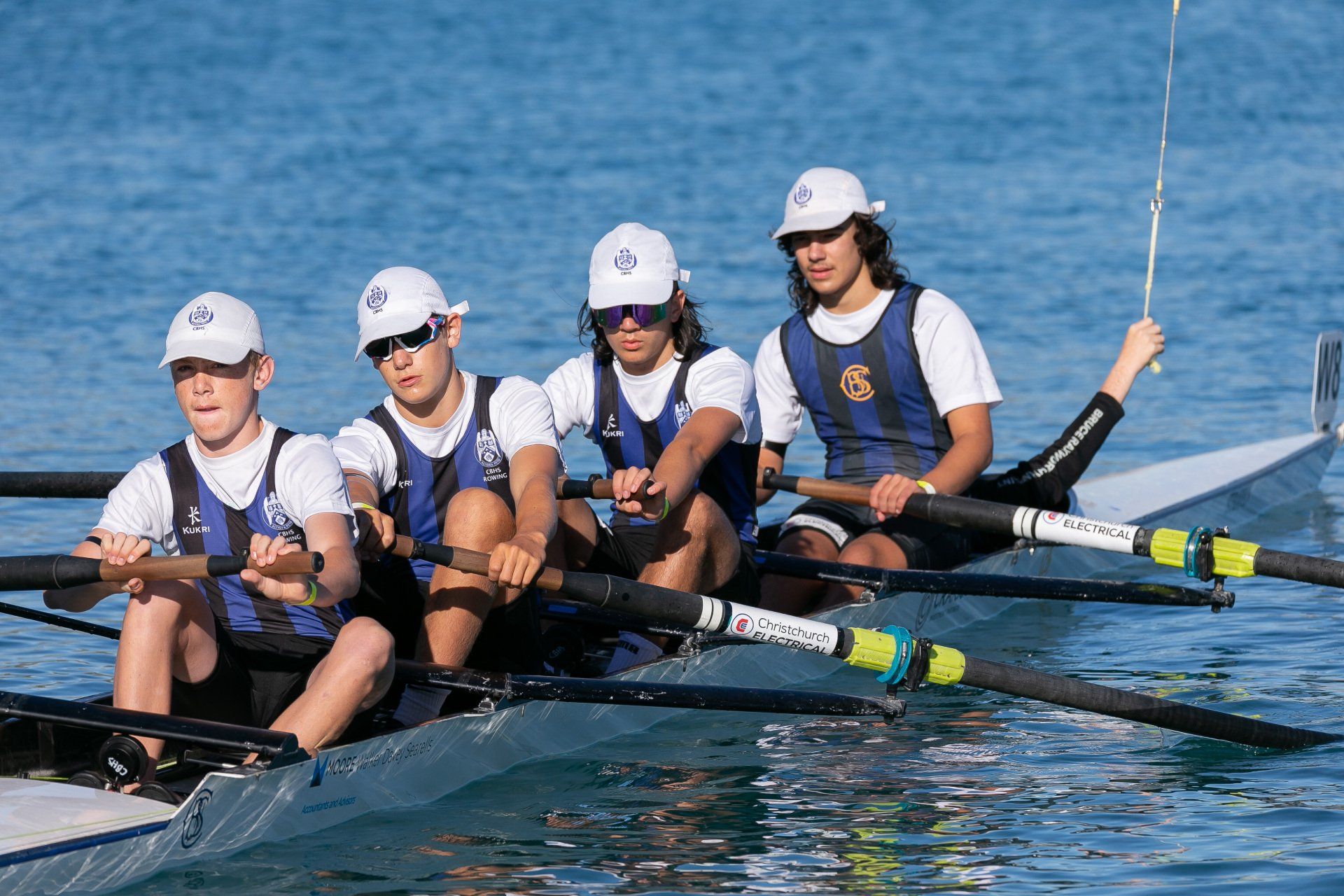 Christchurch Boys Rowing Team in Christchurch Electrical sponsored boat