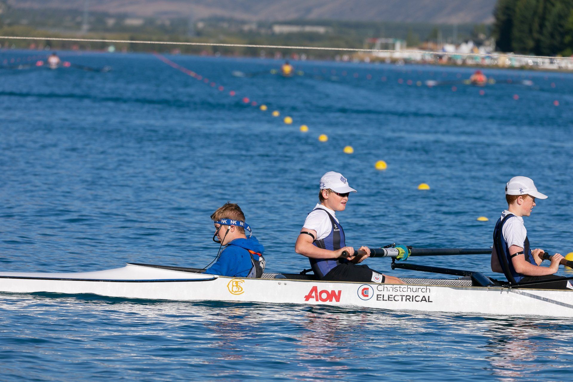 Christchurch Boys Rowing Team in Christchurch Electrical sponsored boat
