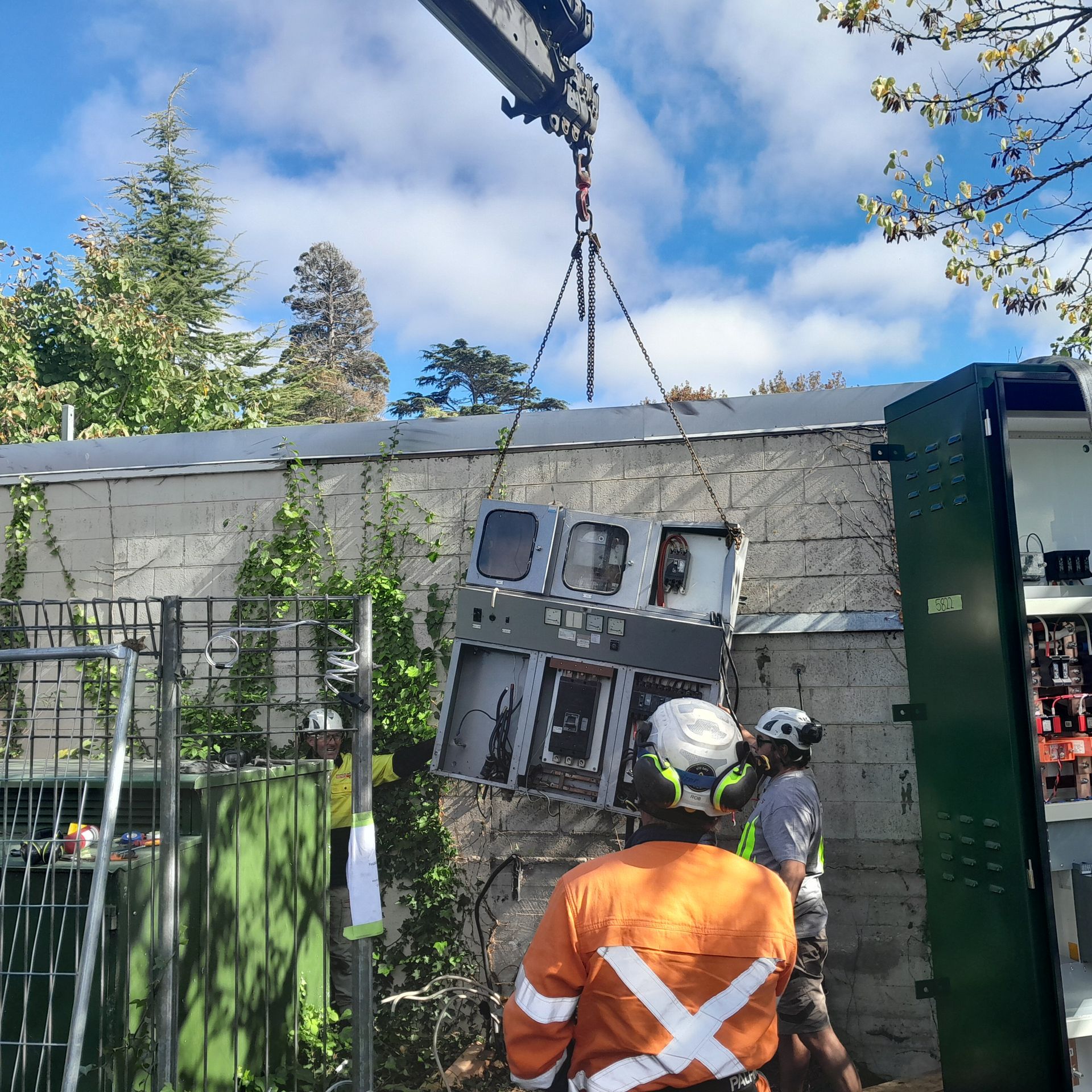 Switchboard being craned away.