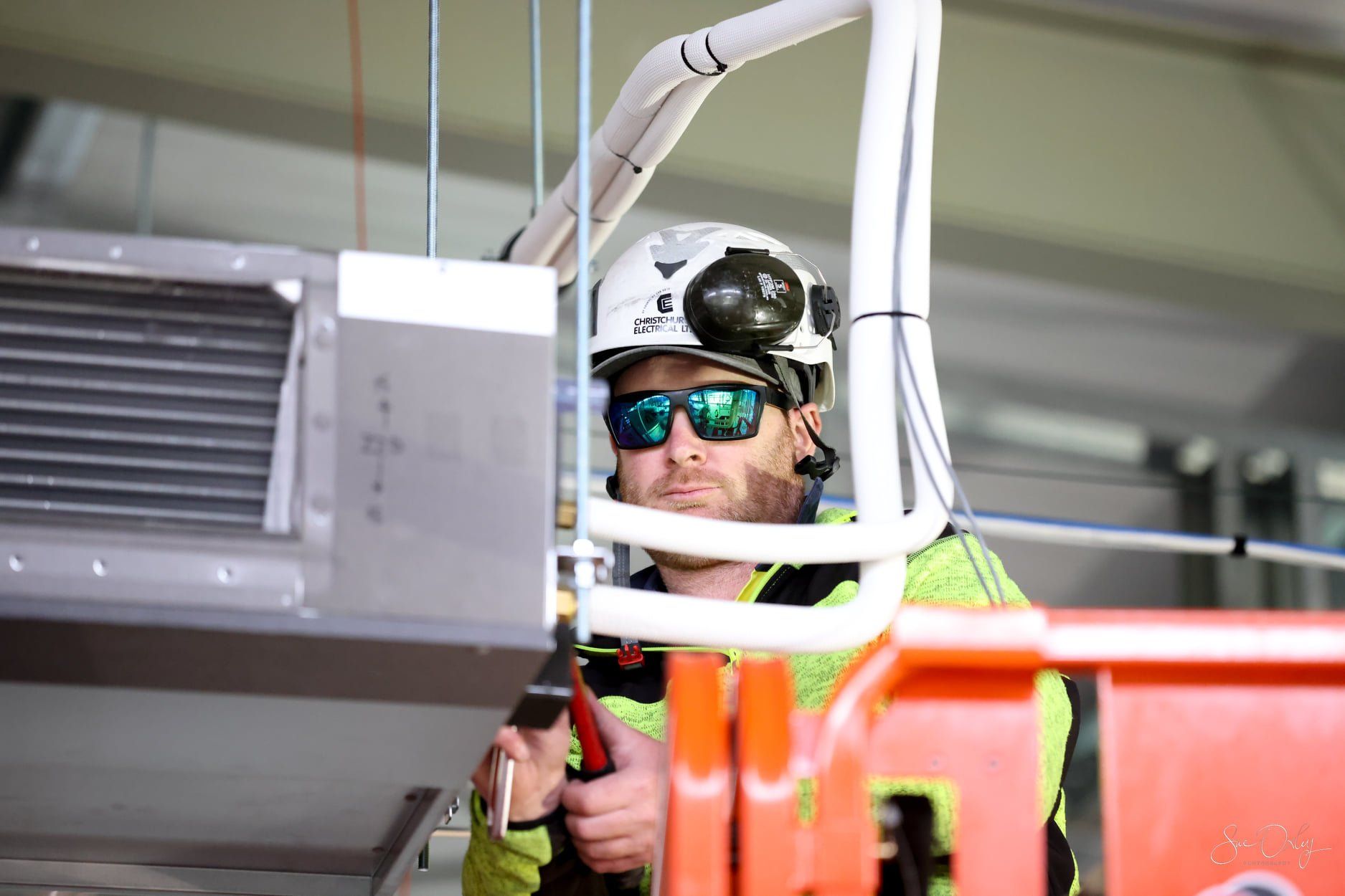BrainTree Wellness Centre -  Heat Pump Installer on Scissor Lift
