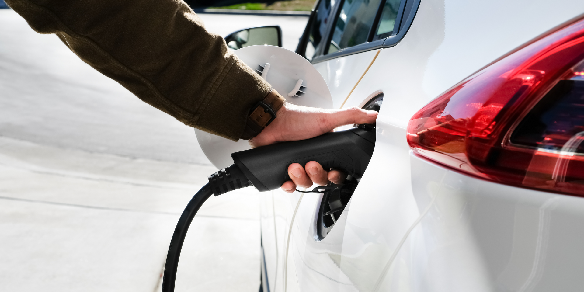 EV charging of white car