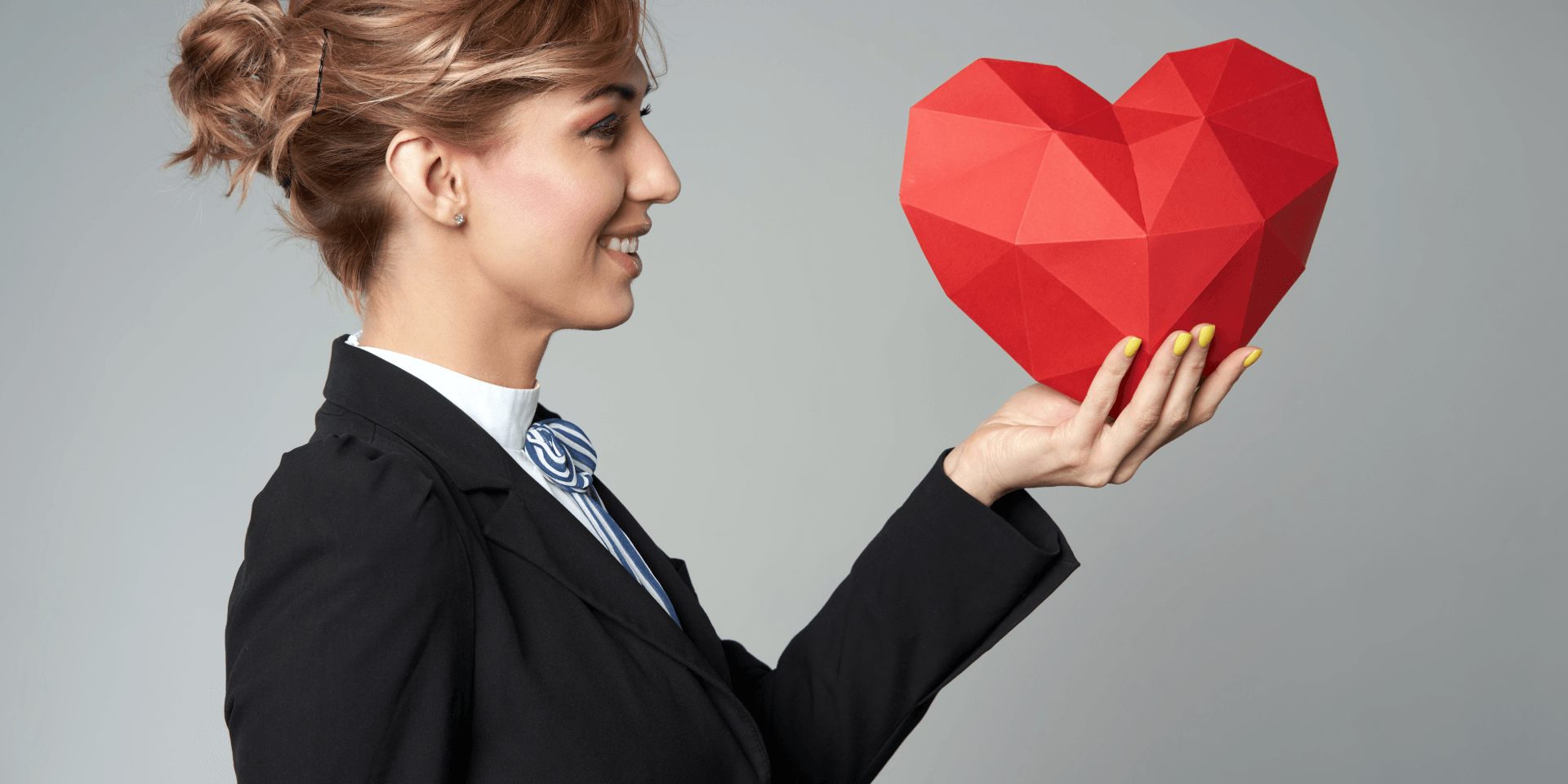 Woman holding heart