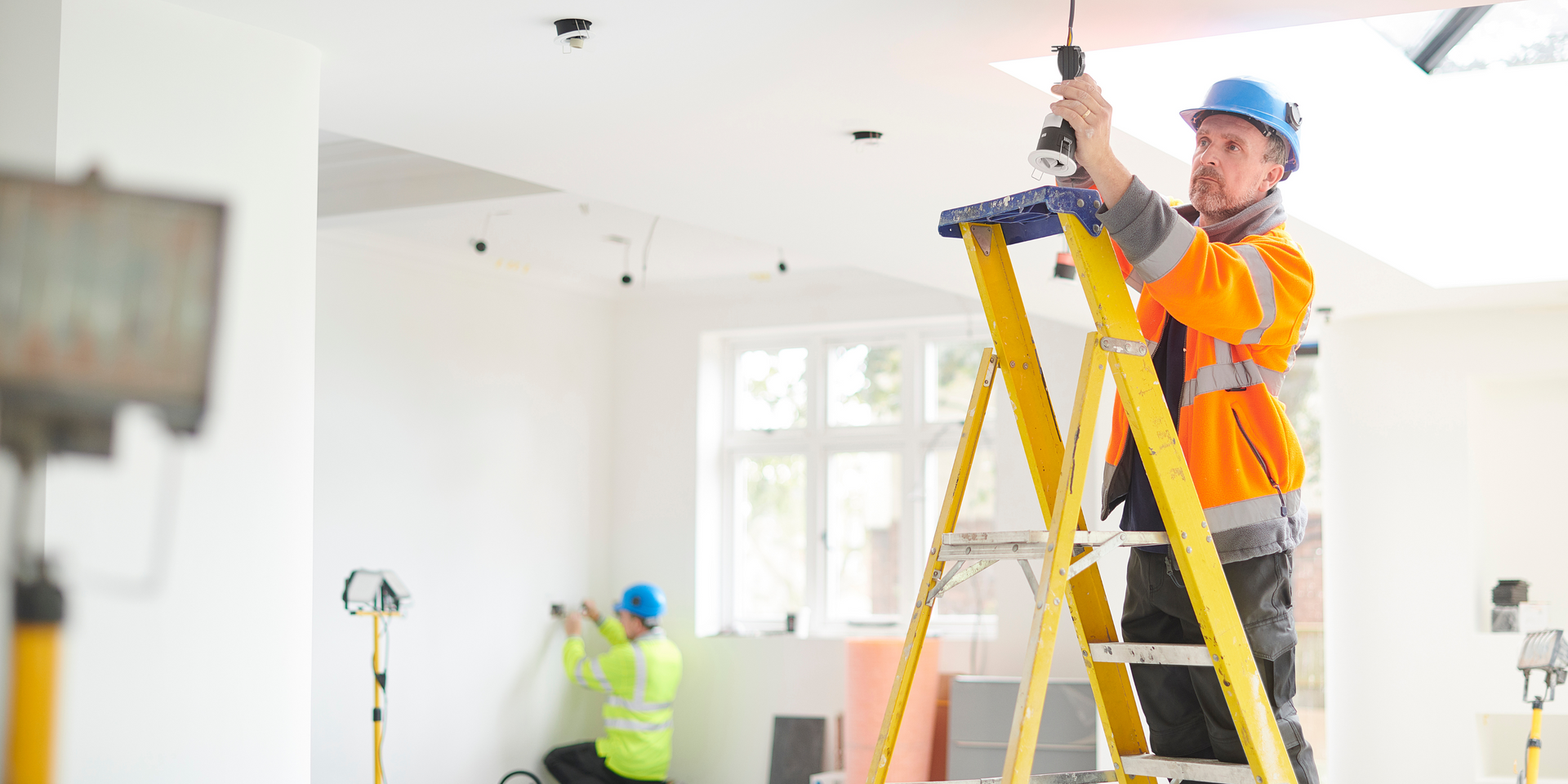 Electrician carrying out wiring work inside ceiling_house_rewiring_Christchurch_Electrical_NZ