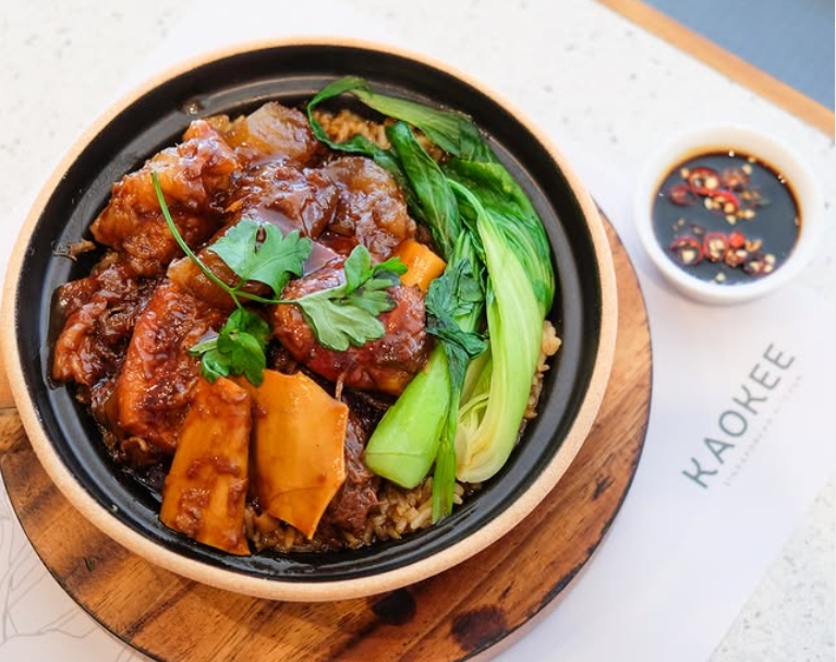 Braised pork rice bowl with bok choy and dipping sauce at Kaokee