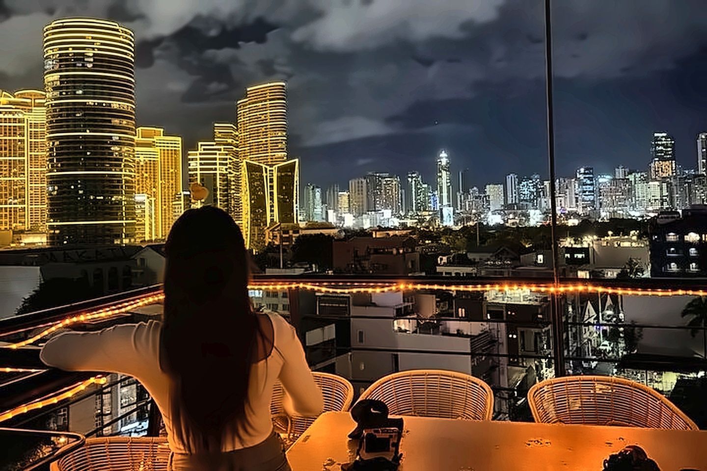 Rooftop lounge with city skyline views at The Belamy House Makati