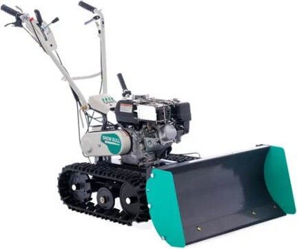 Tracked snowplow with a black bucket and green trim, on white ground.
