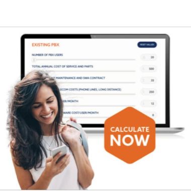 A woman holding a cell phone in front of a laptop that says calculate now
