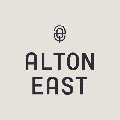 A logo for alton east is on a white background.