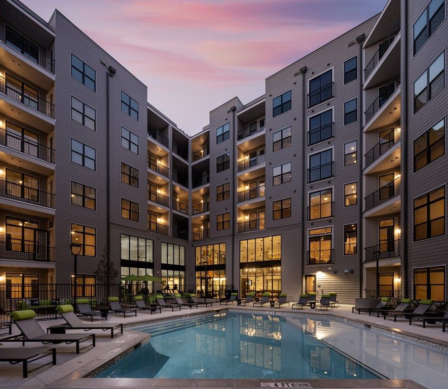 Apartment building with pool.