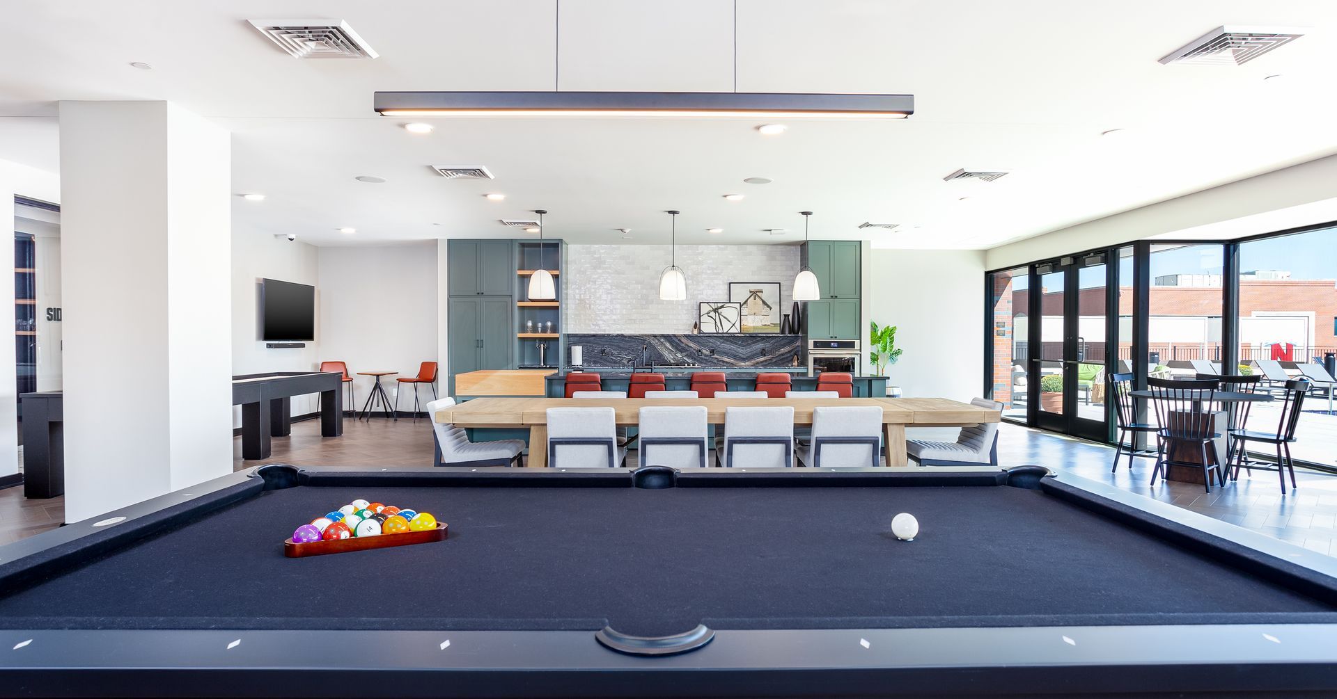 Game room with a pool table.
