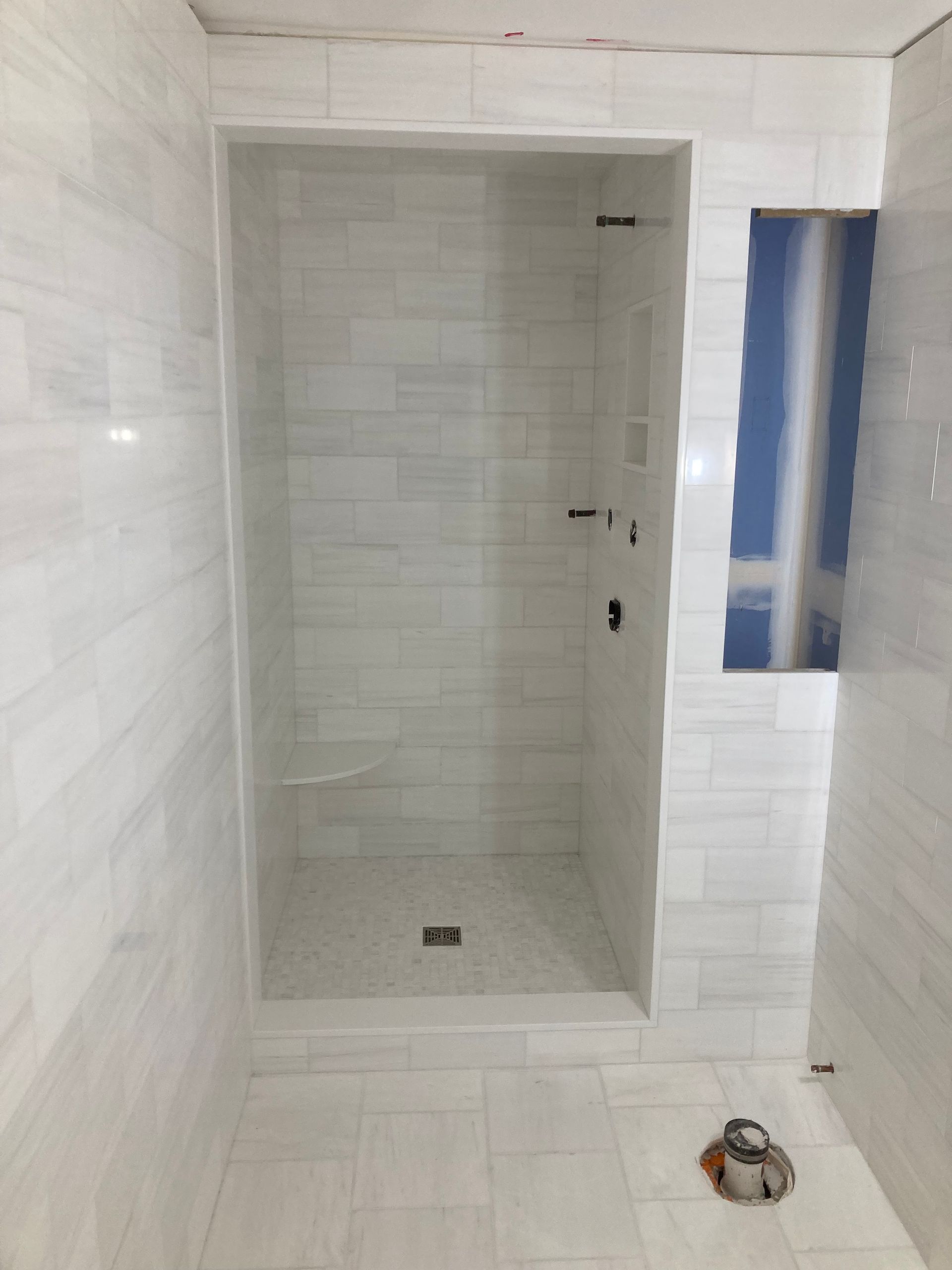Marble tile bathroom renovation Stamford CT by Executive Homes LLC