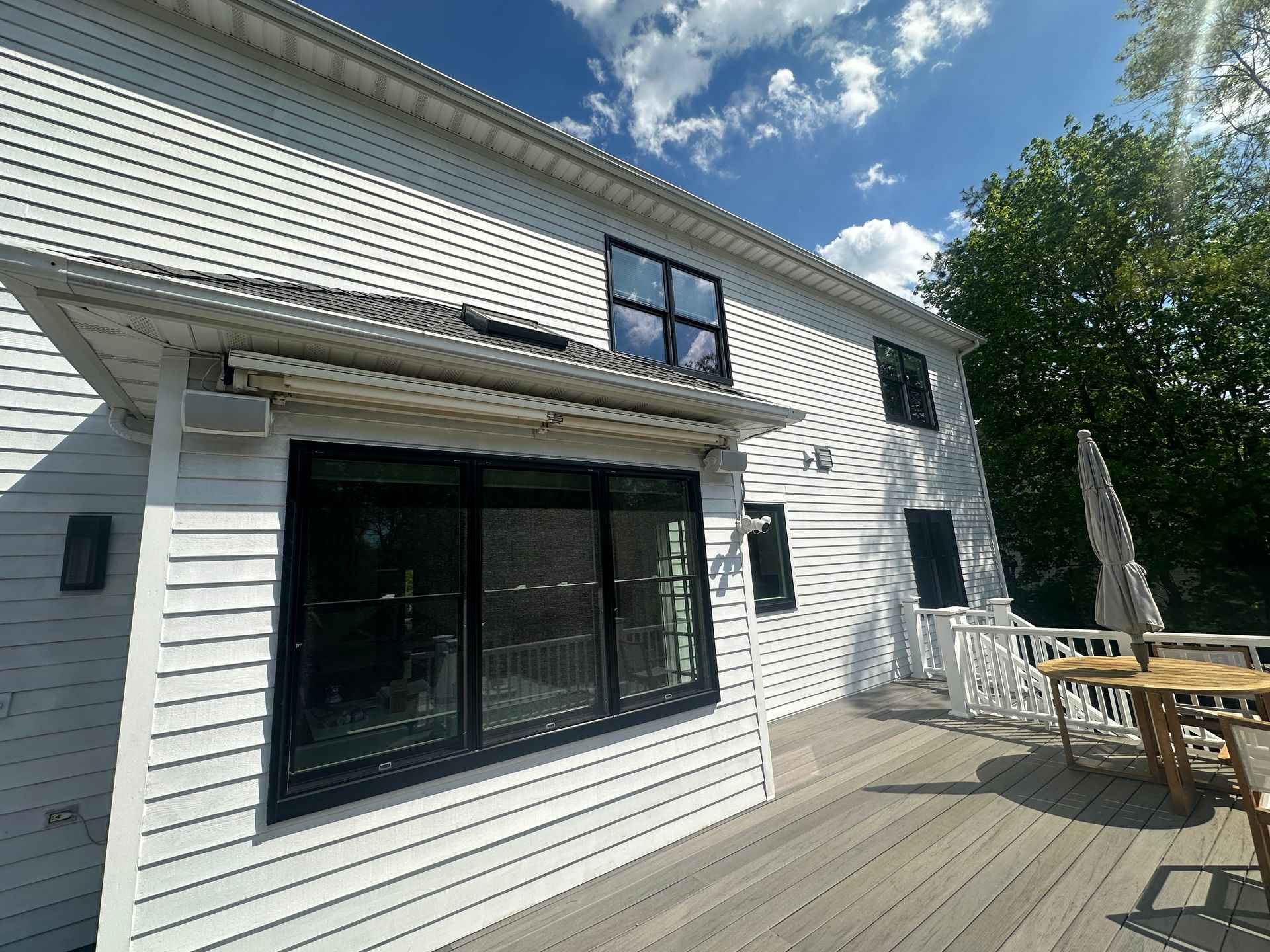 White vinyl siding and window replacement CT by Executive Homes LLC