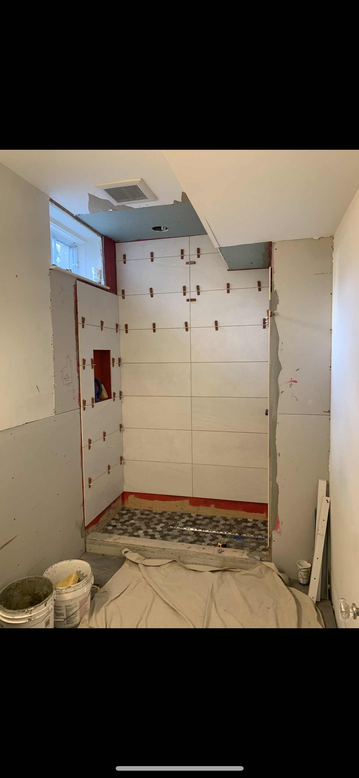 Tile installation in progress Fairfield County CT by Executive Homes