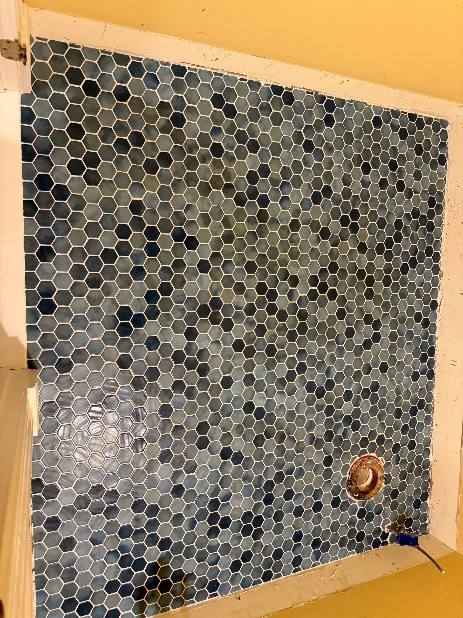Black hexagon mosaic tile installation Fairfield County CT by Executive Homes