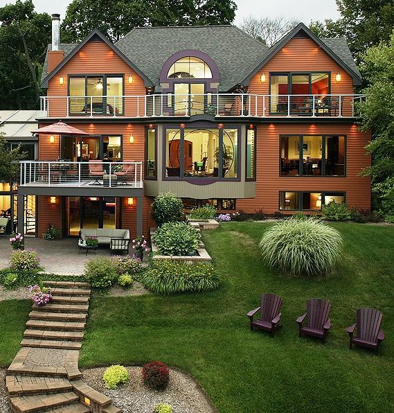 An aerial view of a large house with a lot of windows