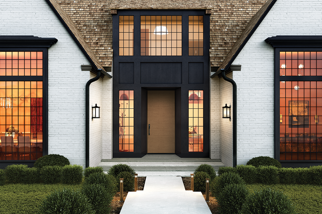 The front of a house with a black door and windows.