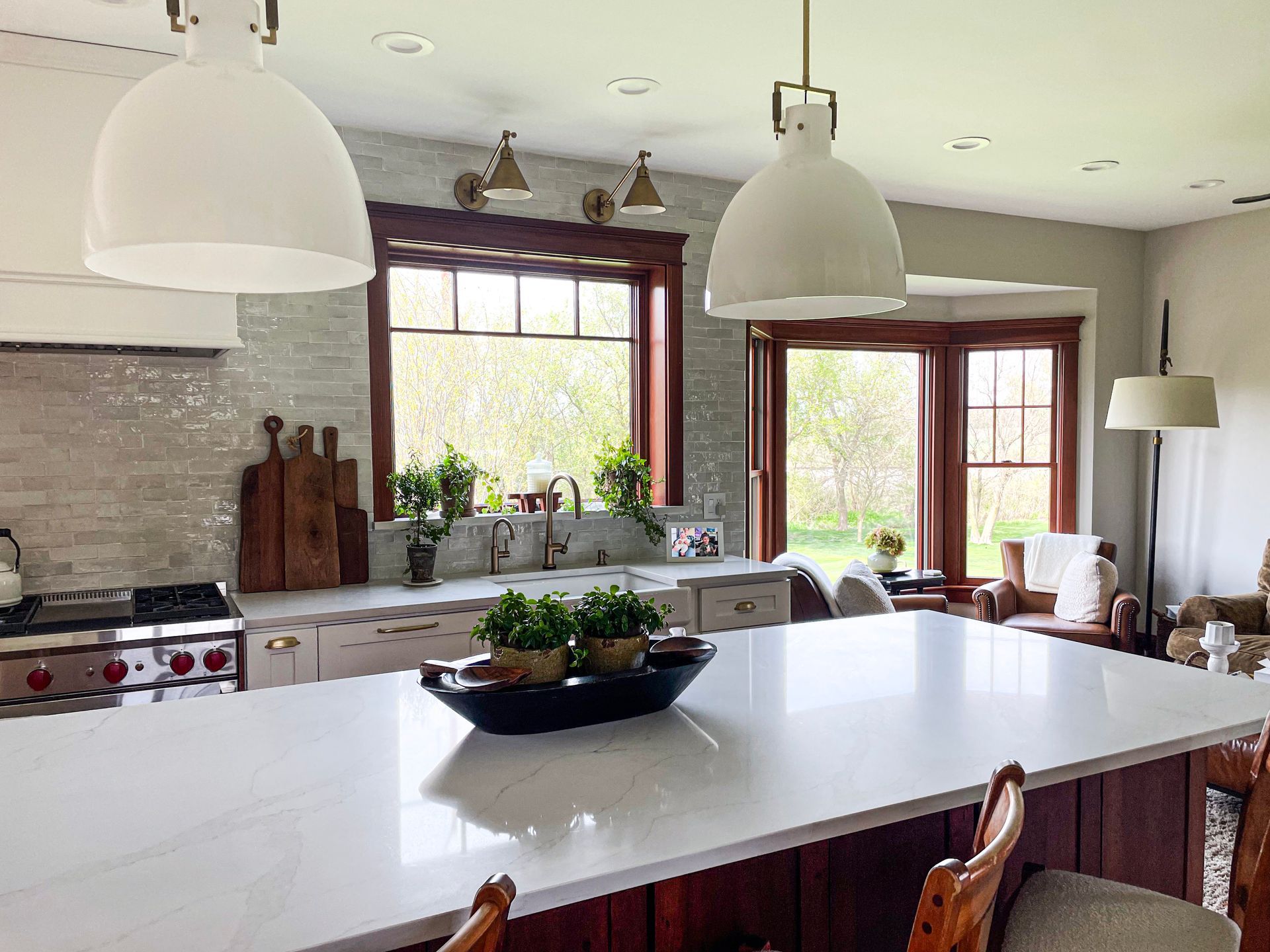 There is a large island in the middle of the kitchen.