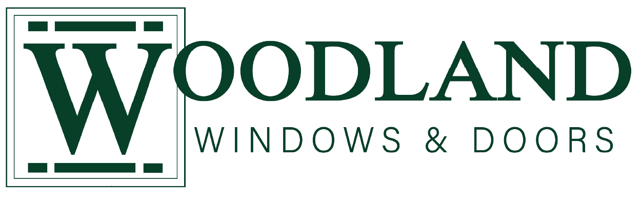 Logo for Woodland Windows & Doors, featuring a stylized letter