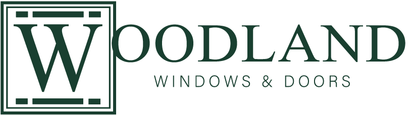 Logo for Woodland Windows & Doors. A dark green