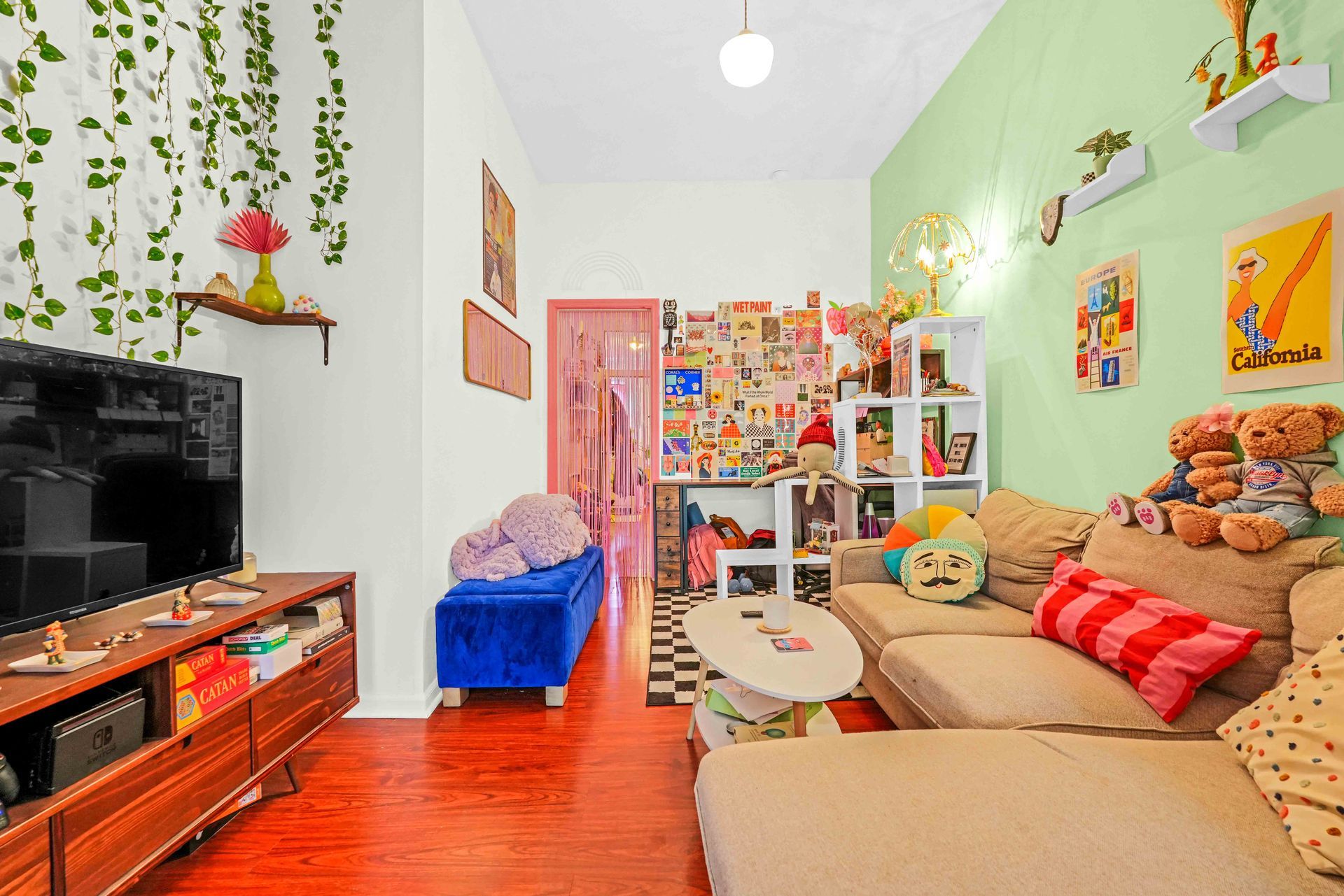 A living room filled with furniture and a flat screen tv.