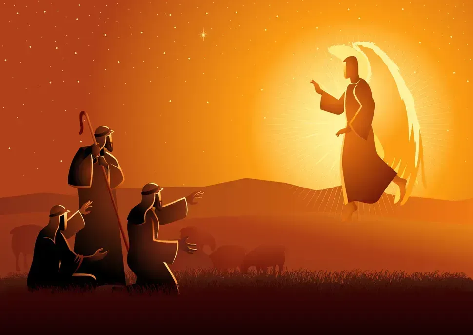 Silhouetted people kneel in prayer before a glowing angel at sunset in a desert landscape