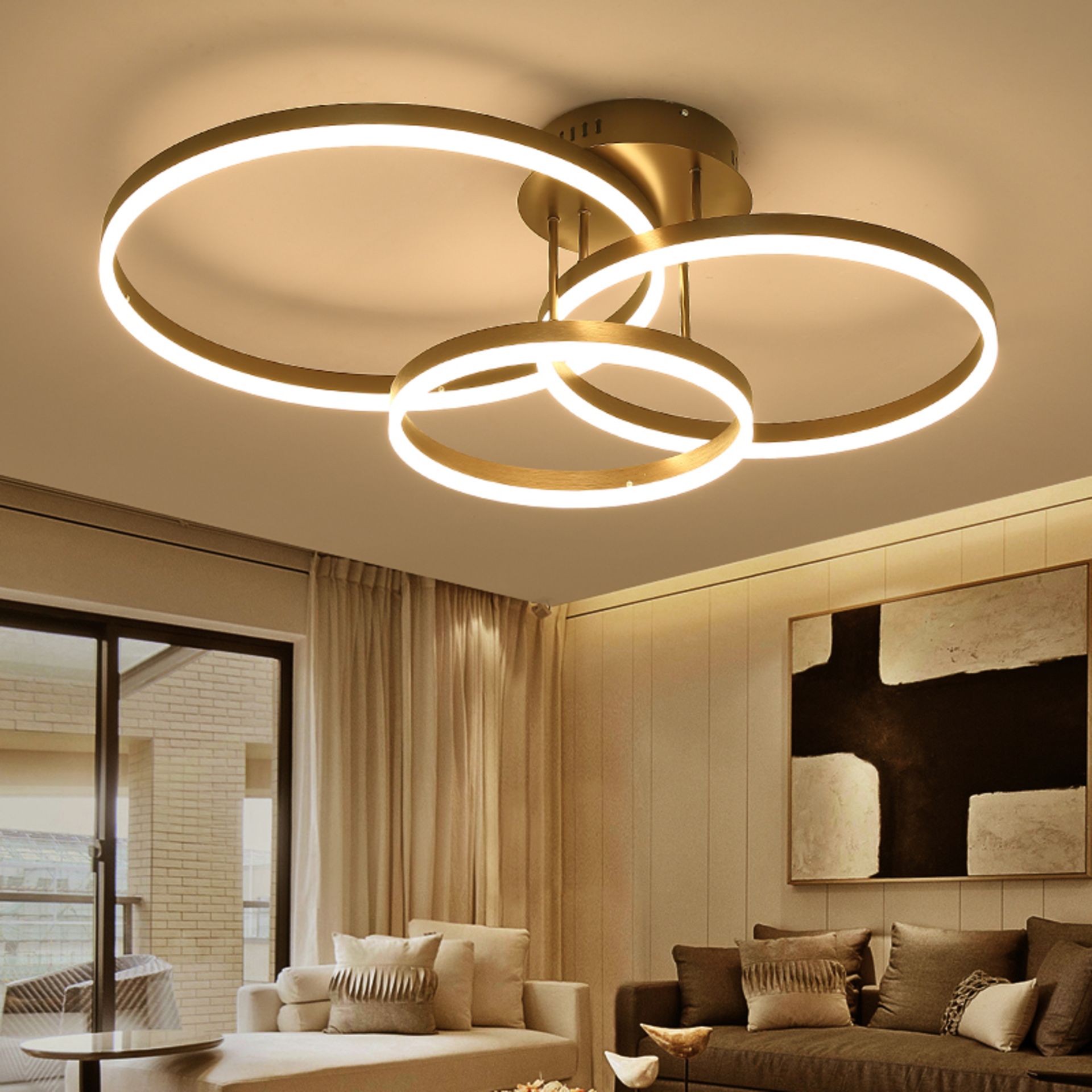 A living room with a couch and a ceiling light