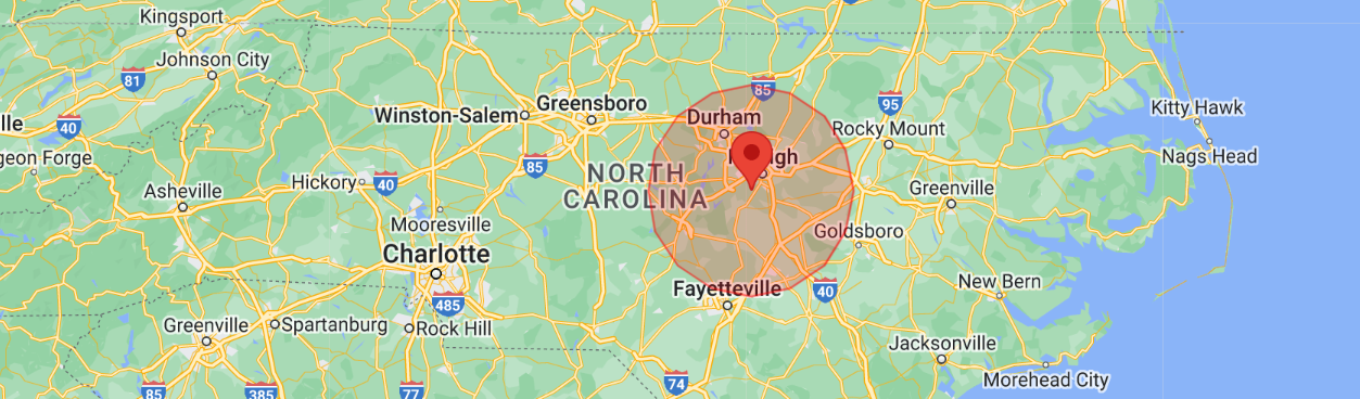 A map of a city with a red circle around it.