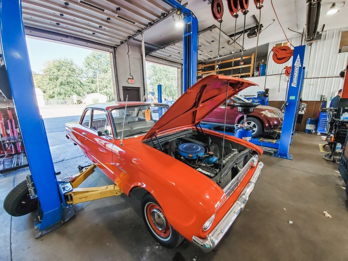 Car With an Open Hood at the Shop | Beer's Automotive Services and Repair