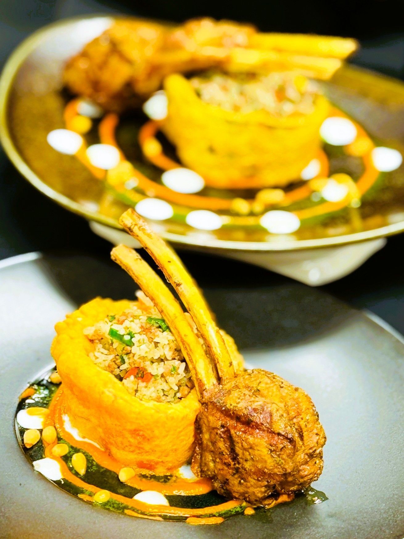 Refined dish with double bone lamb chop with stuffed red pepper with Basmati and lamb