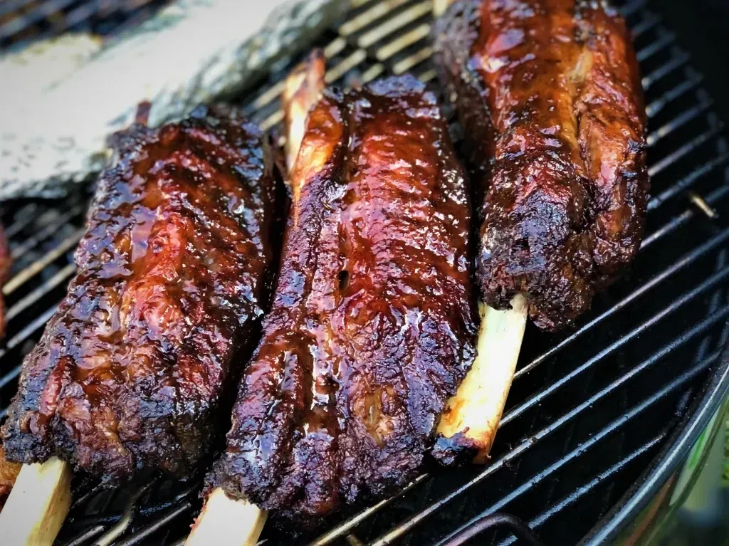 Slow smoked long bone beef ribs
