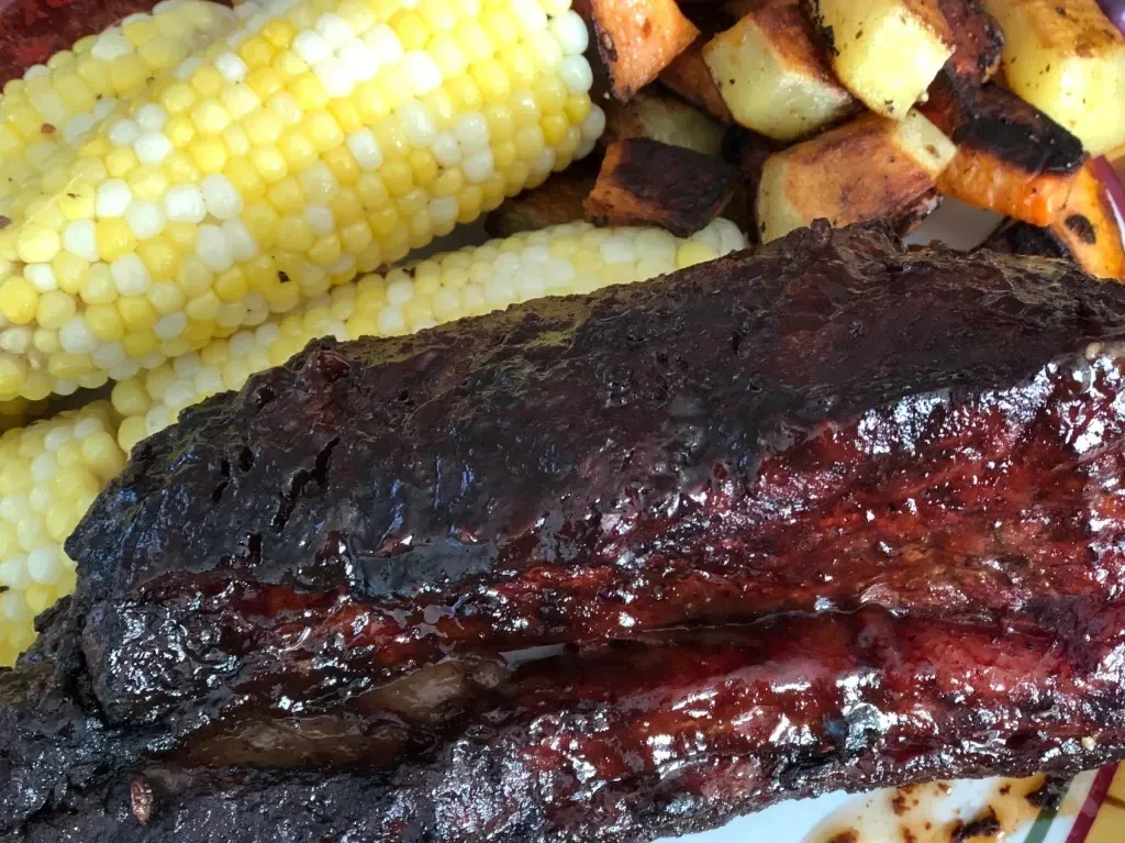Low and slow smoked beef ribs ready to eat
