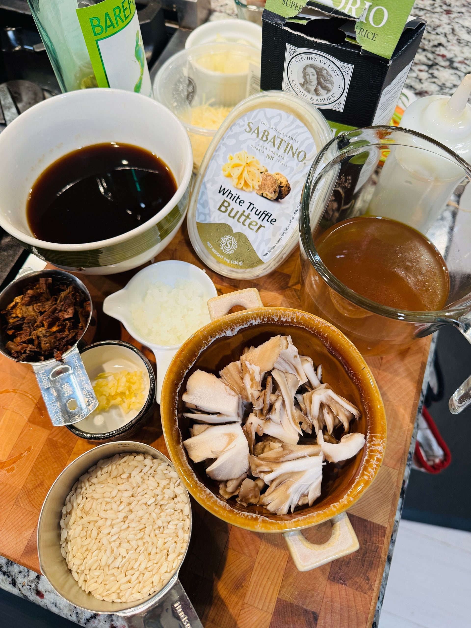 Items to prepare wild mushroom risotto.