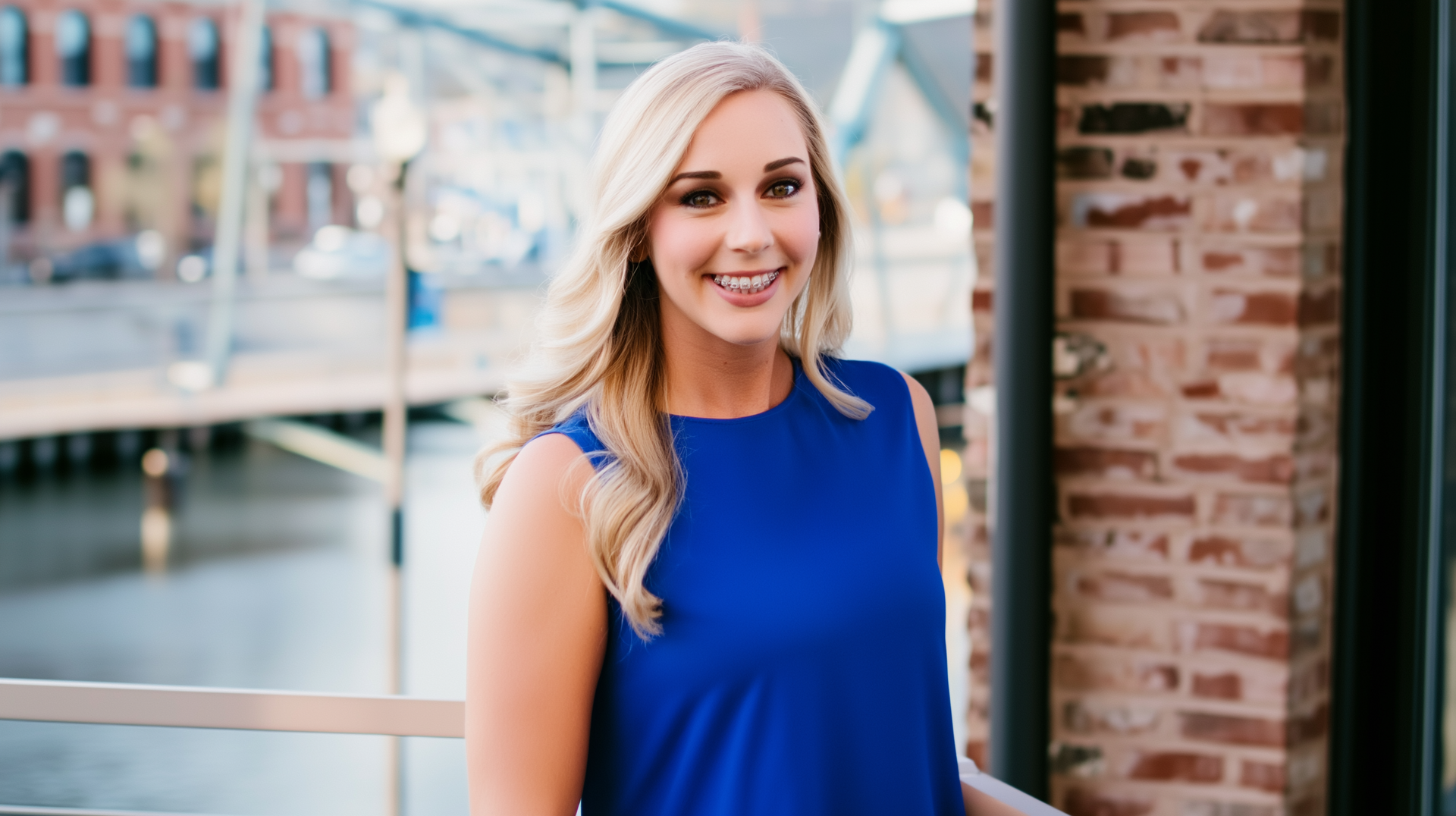 Smiling woman with braces representing confident orthodontic treatment at Scenic City Orthodontics