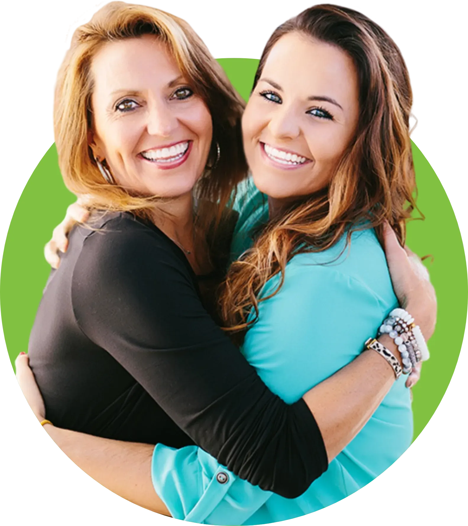 Two women hugging each other on a green background