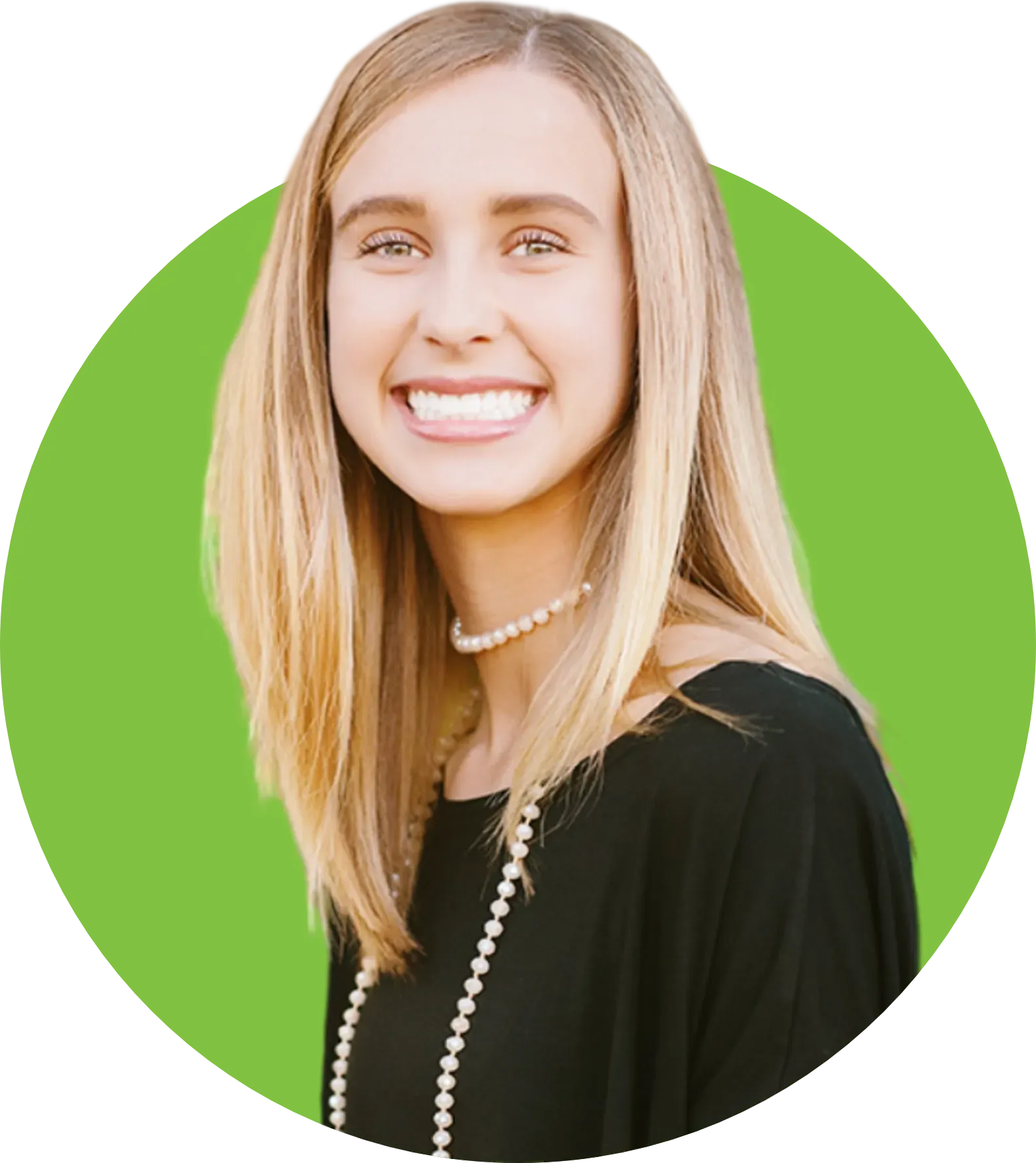 A woman wearing a black shirt and a pearl necklace is smiling in a green circle.