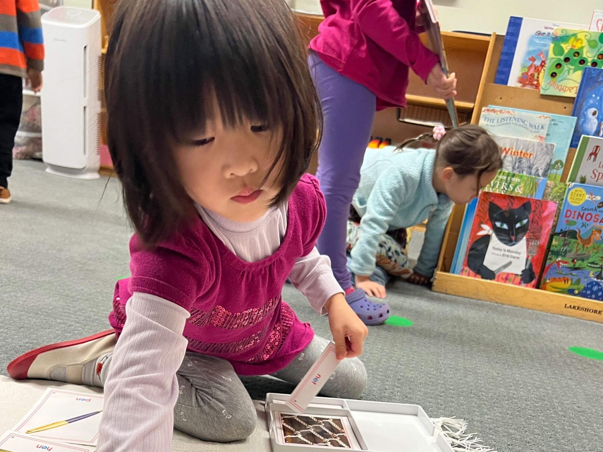 montessori child working in classroom