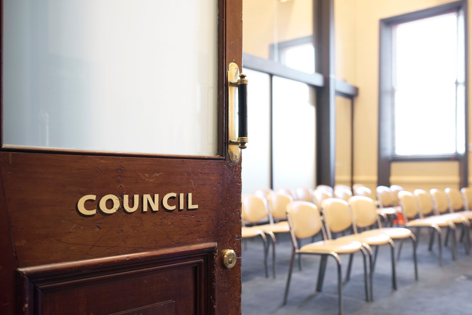 Doorway to a council meeting room, labeled