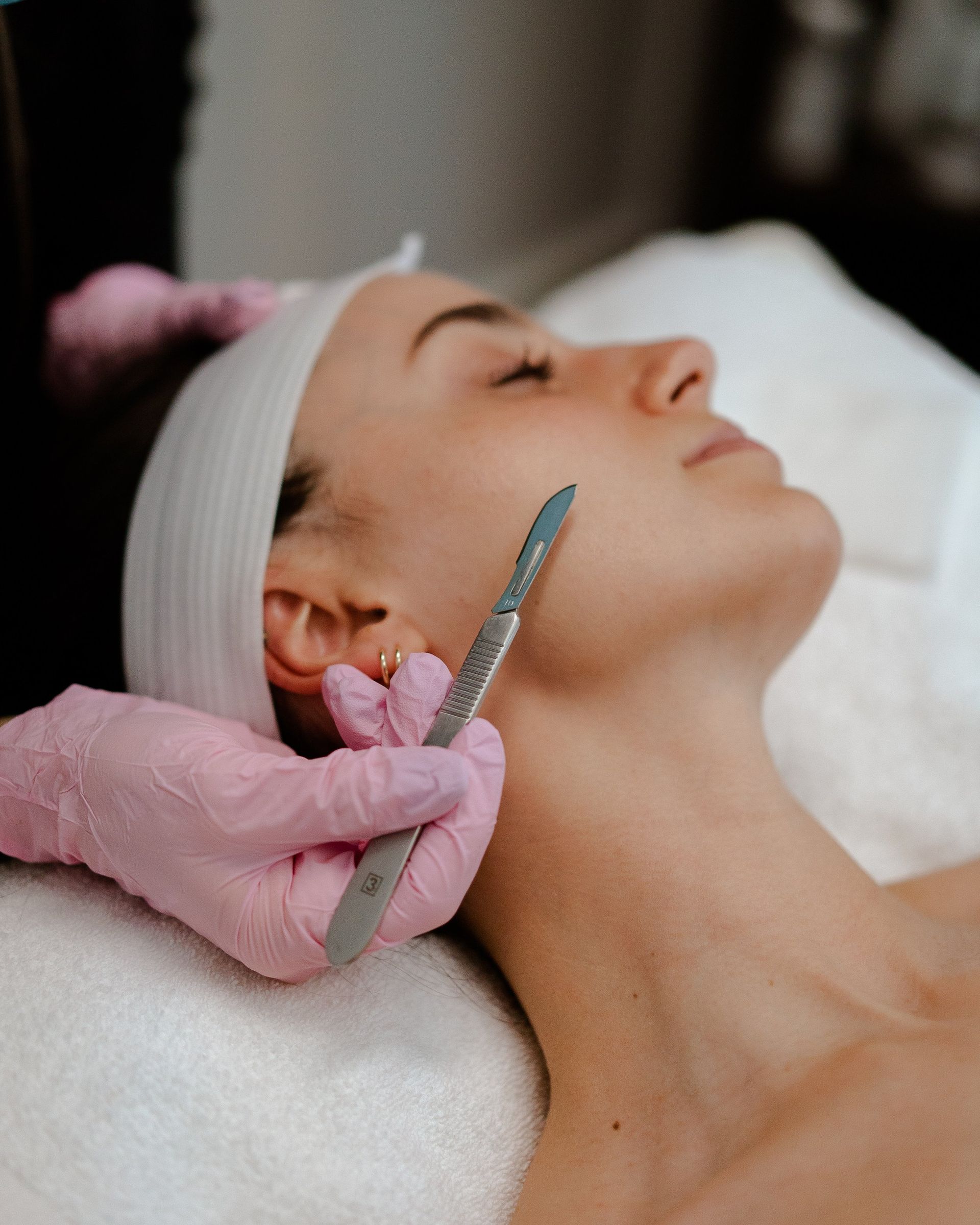 positive lady enjoys morning spa treatment