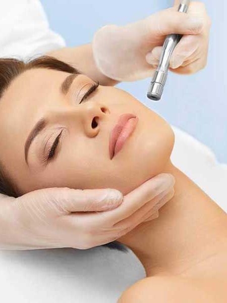 woman getting microdermabrasion treatment