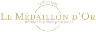 Logo doré du Médaillon d'Or, résidence privée pour seniors, fondée en 1992, sur fond blanc.