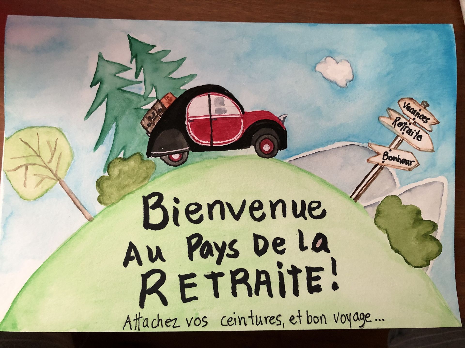 Watercolor painting of a red car driving on a hill. Text reads: 