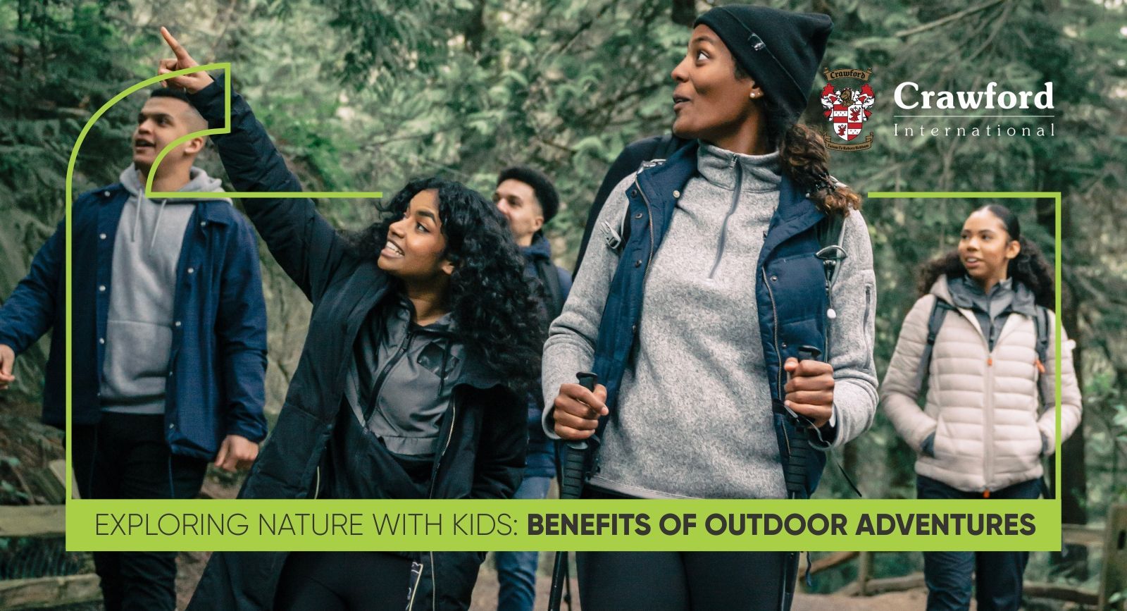 A group of people are walking through a forest.