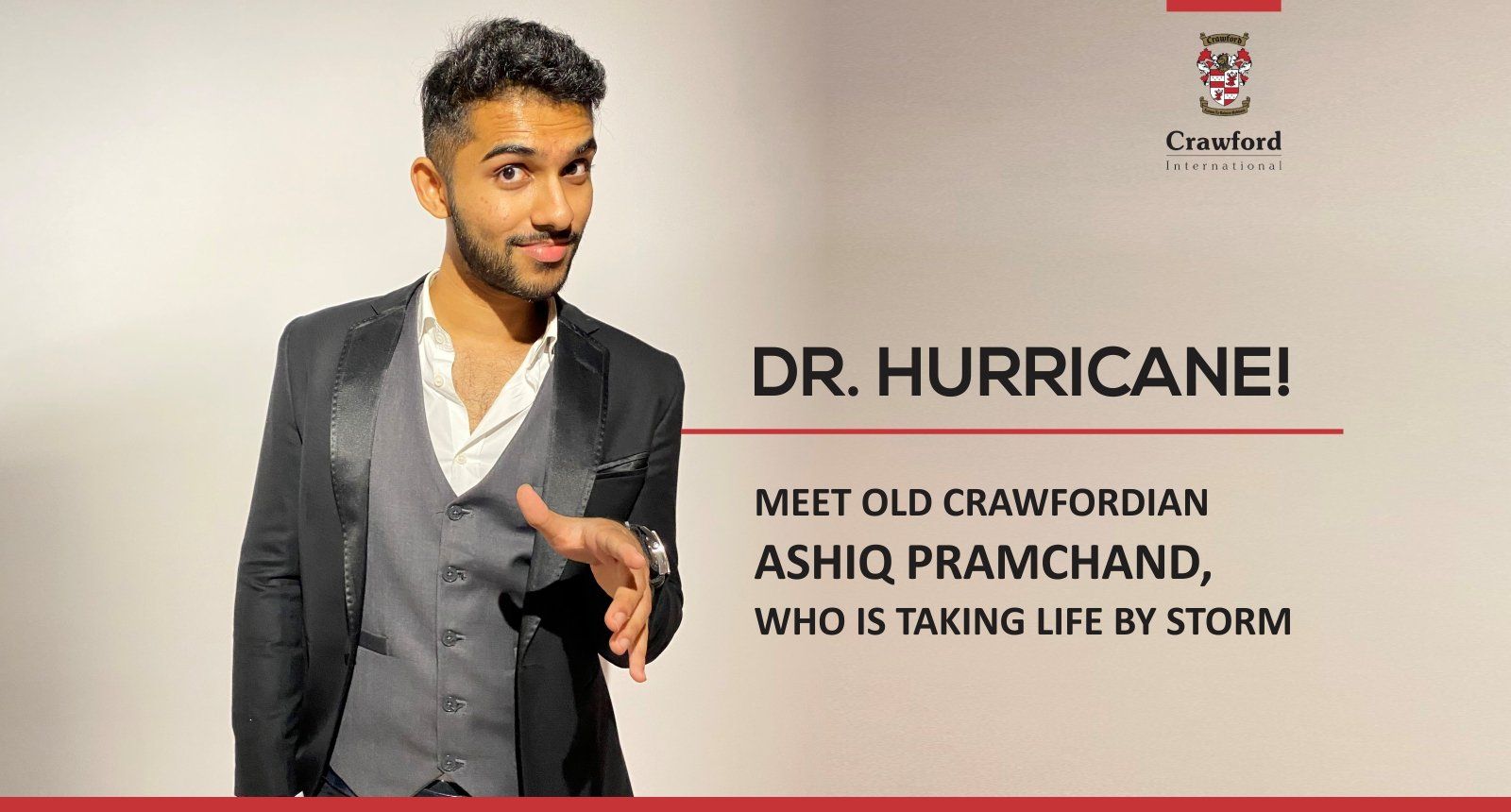 A man in a suit is standing in front of a sign that says dr. hurricane