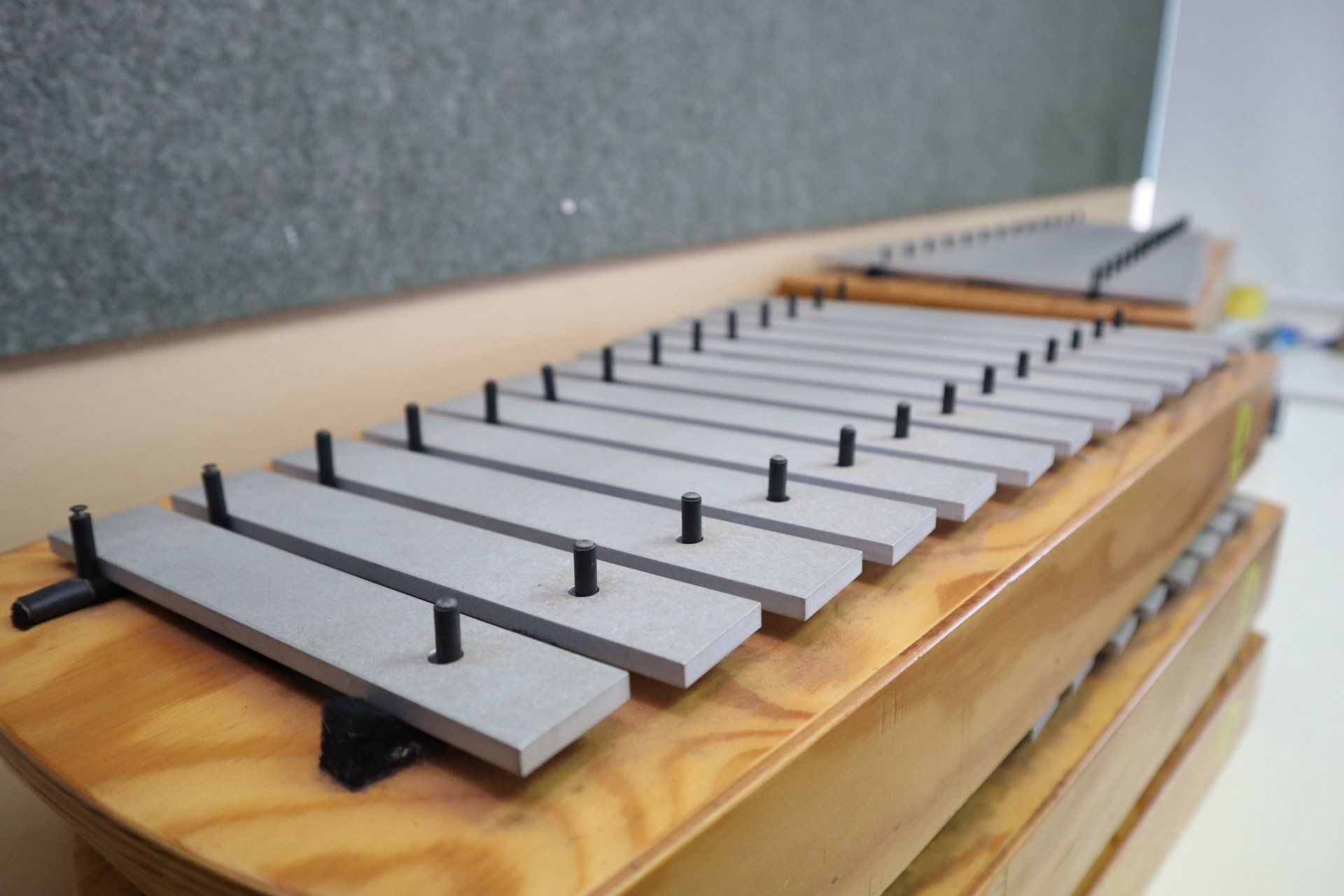 a wooden xylophone is sitting on a table