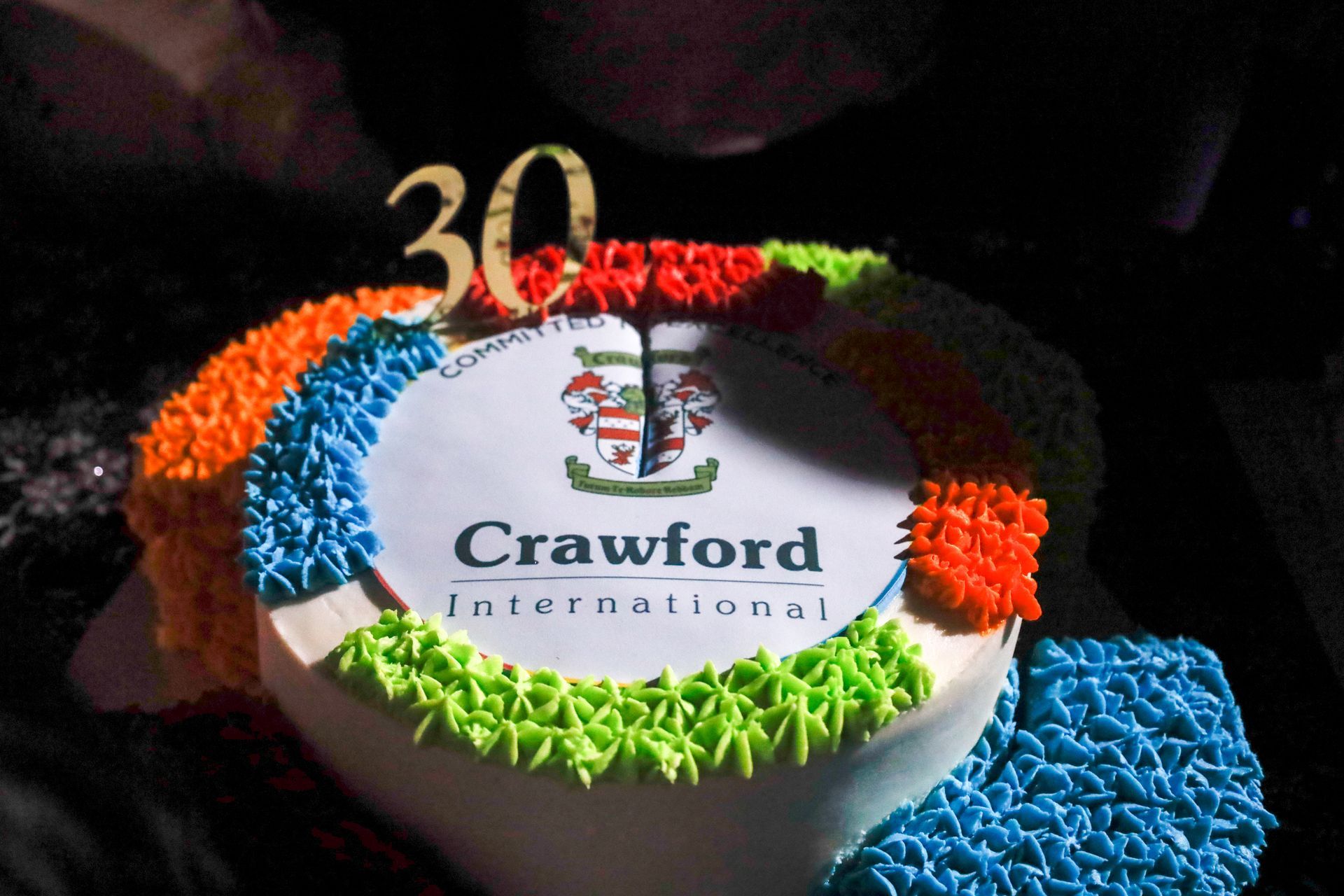 A cake with the word crawford on it